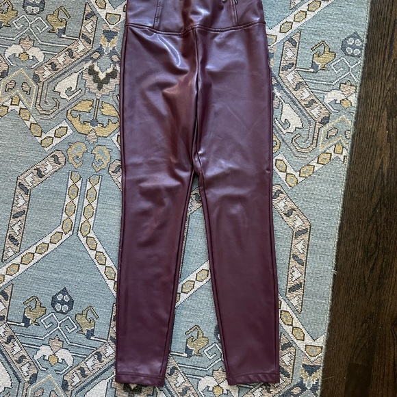 Faux leather burgundy leggings. They have a soft lining. Very comfortable! - Picture 2 of 4